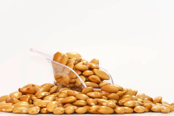 a Yellow Beans in a white background