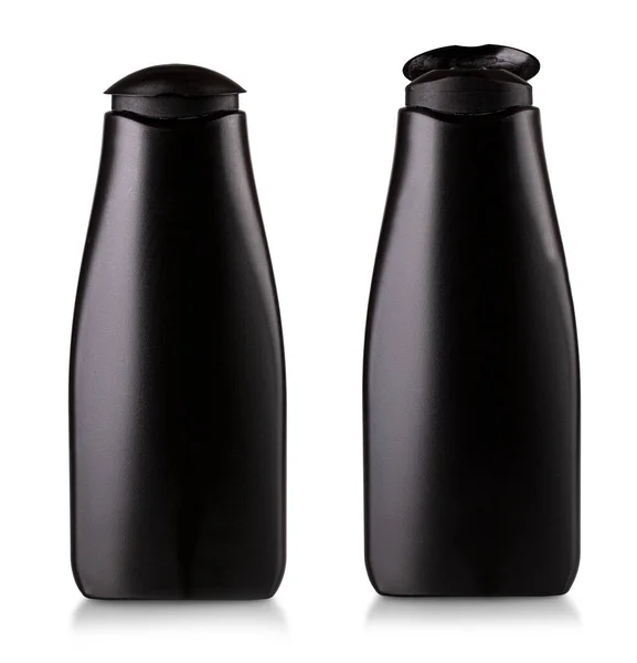 Aberto frasco de xampu de plástico preto isolado no fundo branco — Fotografia de Stock