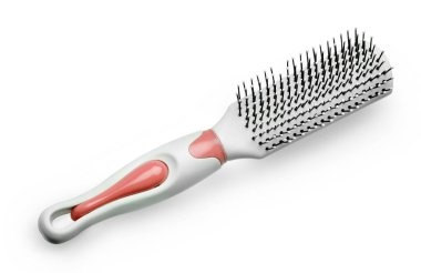 Beyaz arkaplanda izole edilmiş beyaz masaj plastik tarak
