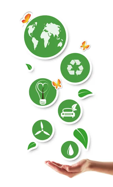 Mão segurando ícones ecológicos verdes — Fotografia de Stock