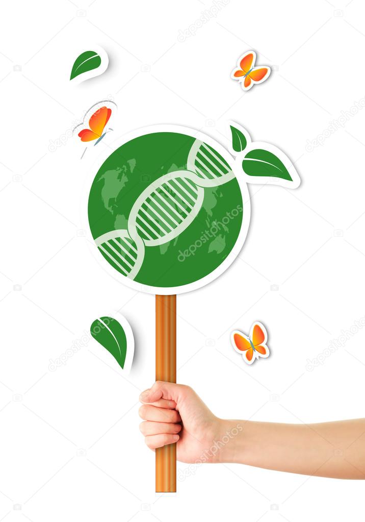 Hand holding green sign with dna