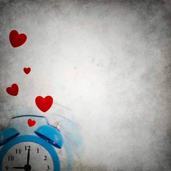 Vignette background with love ringing clock playing hide and seek — Stock Photo, Image