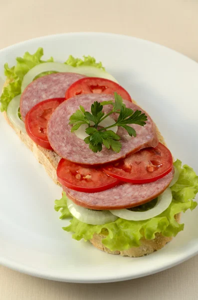 Sandwich with a cervelat (sausage) . — Stockfoto