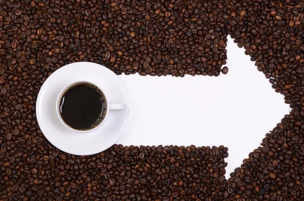 ok biçiminden bir kahve ve bir oral seks çok kahve taneleri.