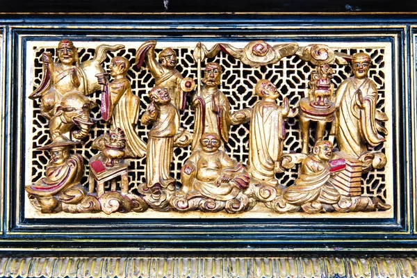 Gamla golden kinesiska tempel scuplture — Stockfoto