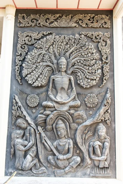 Alte alte Buddha-Skulptur an der Wand — Stockfoto