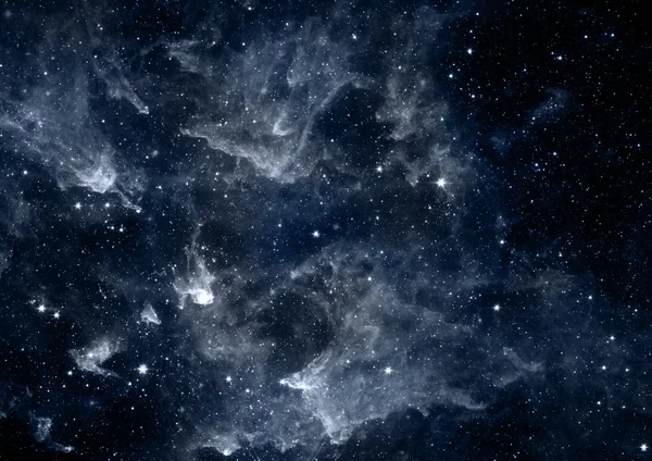 Uzayda bir yıldız alanı ve bir nebula