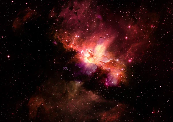 Uzayda bir yıldız alanı ve bir nebula