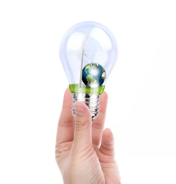 Hand holding light bulb with wind turbine and earth inside (Elem — Stock Photo, Image