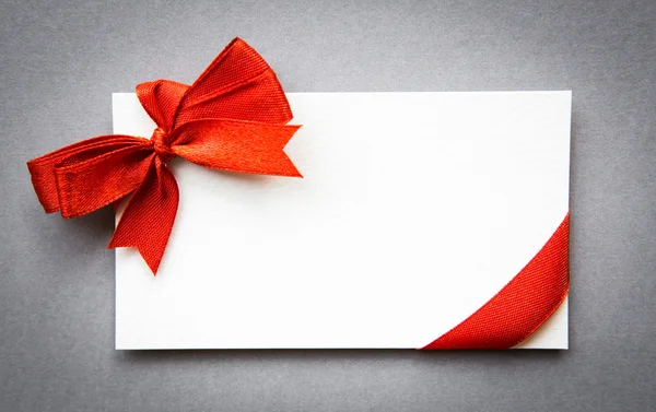 Card with red ribbons bows Stock Picture