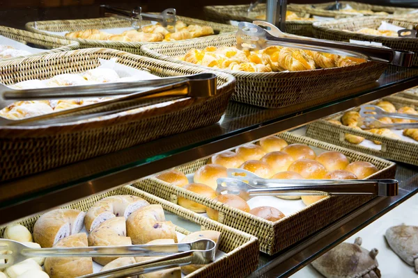 Assortment of fresh pastry on table in buffet — Stock Photo, Image