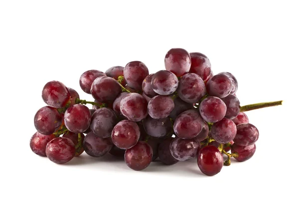 Zamknij z czerwonych winogron na białym tle z kopia miejsce. — Zdjęcie stockowe