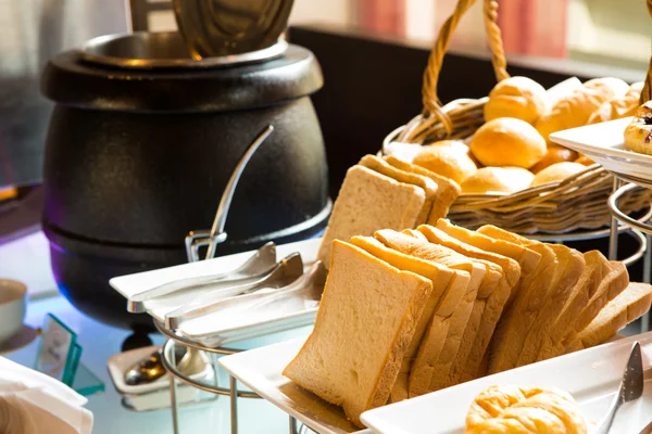 Assortment of fresh pastry on table in buffet — Stock Photo, Image