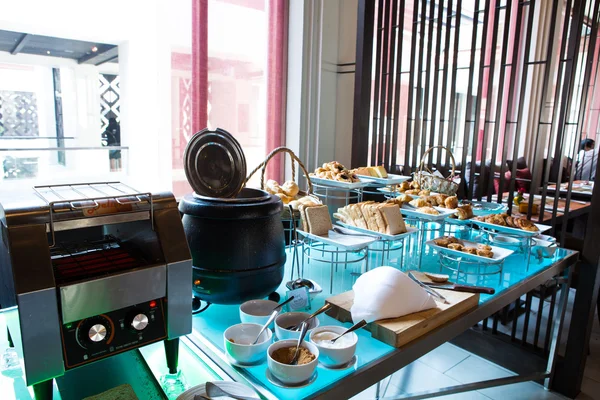 Assortment of fresh pastry on table in buffet — Stock Photo, Image