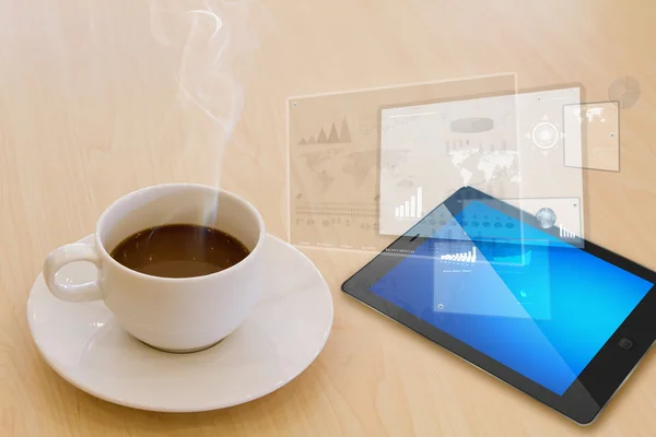 Touch screen device and cup of coffee — Stock Photo, Image
