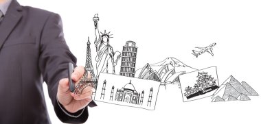 Business man drawing the dream travel around the world
