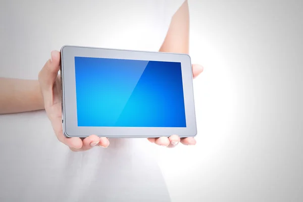 Woman hand using a touch screen device against white background — Stock Photo, Image