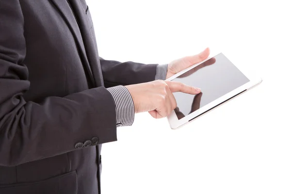 Zakenman met een touchscreen toestel tegen witte pagina — Stockfoto