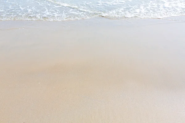 Praia de areia fundo de água — Fotografia de Stock