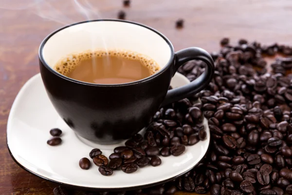 Caffè su sfondo di legno — Foto Stock