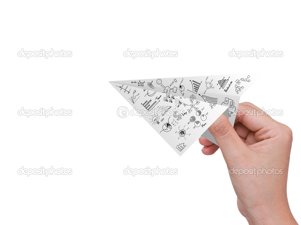 Hand hold Graph Paper plane isolated on white