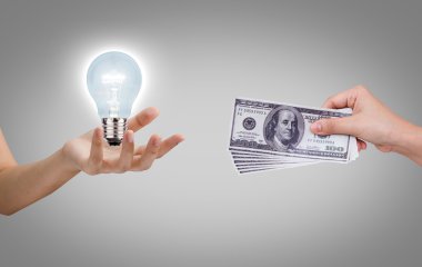 Hand with dollars and light bulb clipart
