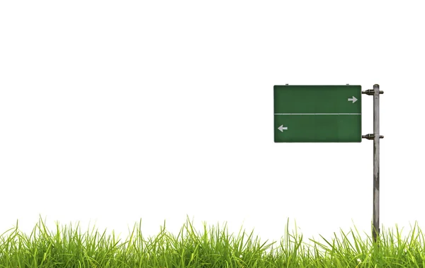 잔디에 녹색 교통 표지 — 스톡 사진