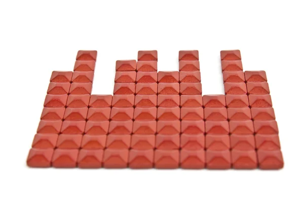 Comprimidos medicinais quadrados vermelhos em um fundo branco com espaço para — Fotografia de Stock