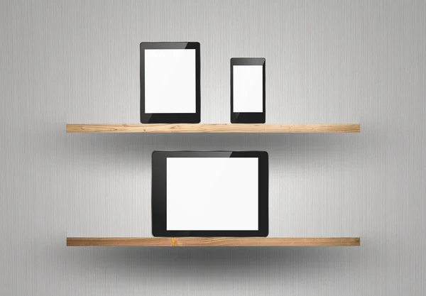 Touch screen device on wood shelf — Stock Photo, Image