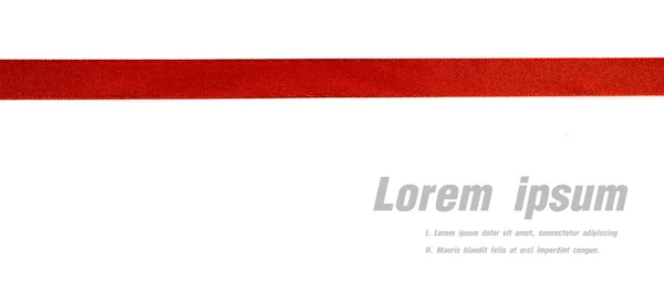 Shiny red ribbon on white background with copy space. — Stock Photo, Image