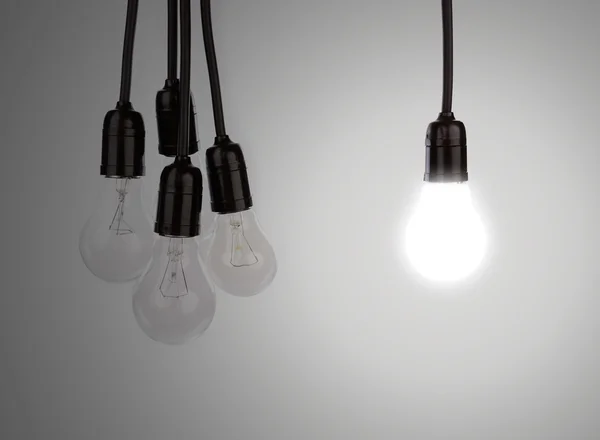 Hanging light bulbs — Stock Photo, Image