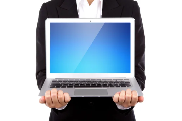 Açık bir dizüstü bilgisayar üzerinde beyaz backgro izole holding iş kişi — Stok fotoğraf