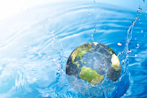 Earth falling into water (Elements of this image furnished by N — Stock Photo, Image