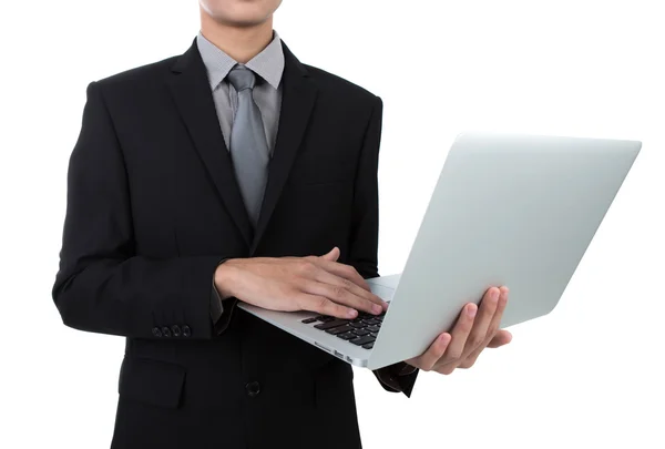 Homem de negócios com laptop contra fundo branco — Fotografia de Stock