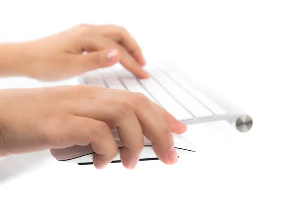 Closeup of business woman hand typing on laptop keyboard with mo — Stock Photo, Image