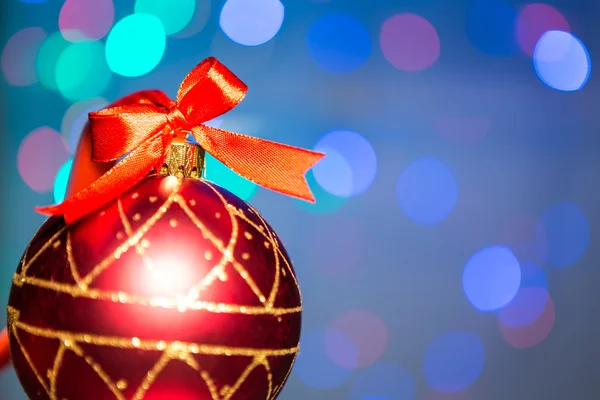 Christmas decoration with red ribbon and Beautiful Bokeh — Stock fotografie