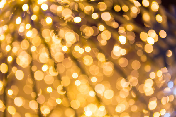 Боке обезглавил золотой абстрактный рождественский фон
