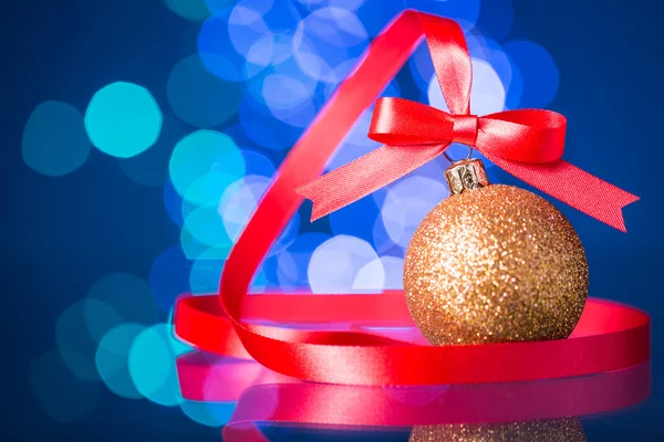 Christmas decoration with red ribbon and Beautiful Bokeh — Stock Photo, Image
