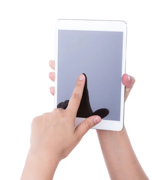 Mulher mão usando um dispositivo de tela sensível ao toque contra fundo branco — Fotografia de Stock