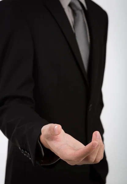 Open hand of business man — Stock Photo, Image