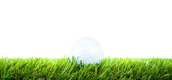 Golf ball on green grass over white background — Stock Photo, Image