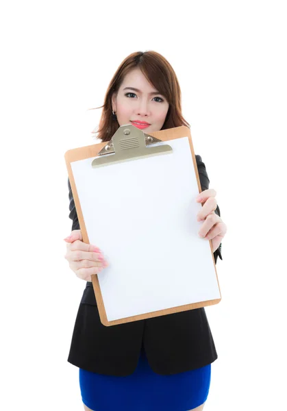 Business woman holding blank paper on clipboard isolated over  w — Stock Photo, Image