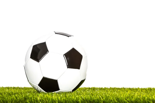 Soccer ball on grass. Isolated — Stock Photo, Image