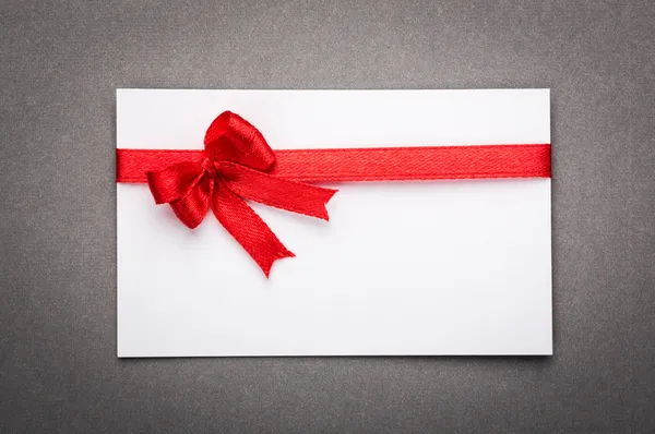 Card with red ribbons bows Stock Photo
