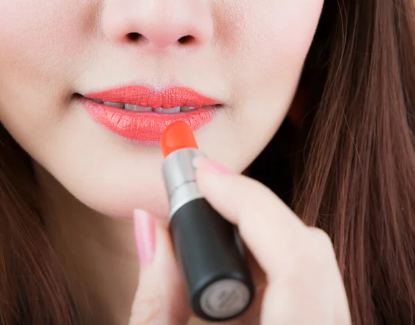 Applying makeup lipstick — Stock Photo, Image