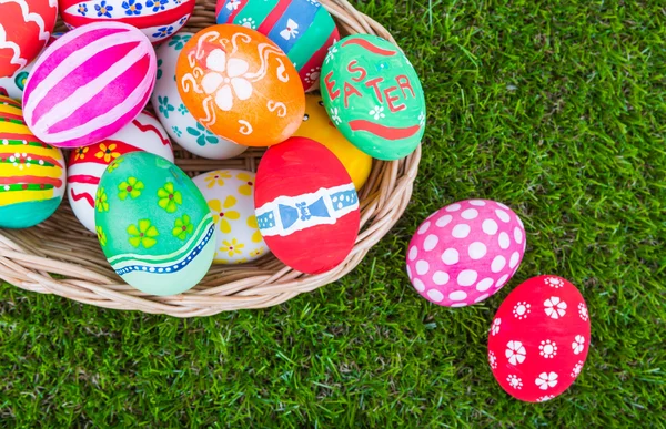 Basket of easter eggs on Fresh Green Grass — Stock Photo, Image