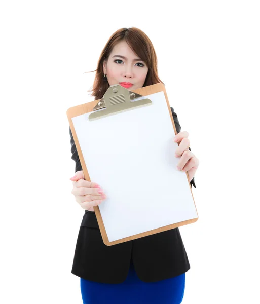 Business woman holding blank paper on clipboard isolated over wh — Stock Photo, Image