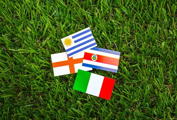 Paper cut of flags on grass for Soccer championship 2014 , group — Stock Photo, Image