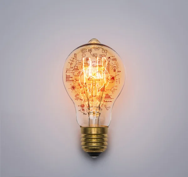 Glödlampa med ritdiagram — Stockfoto