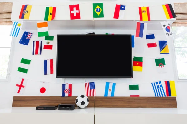 Modern szoba tv-vel és zászlók a futball világbajnokság 2014 — Stock Fotó